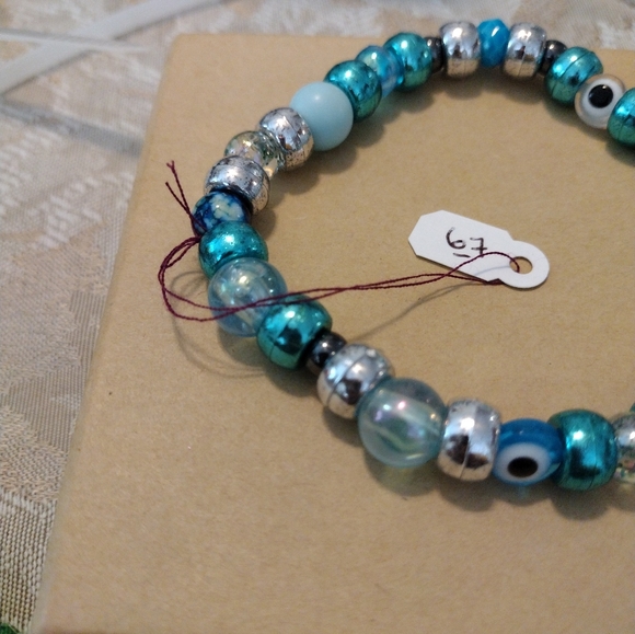 Artemis's Gems custom made beaded bracelet with bumblebees and evil eye charms - Picture 3 of 4